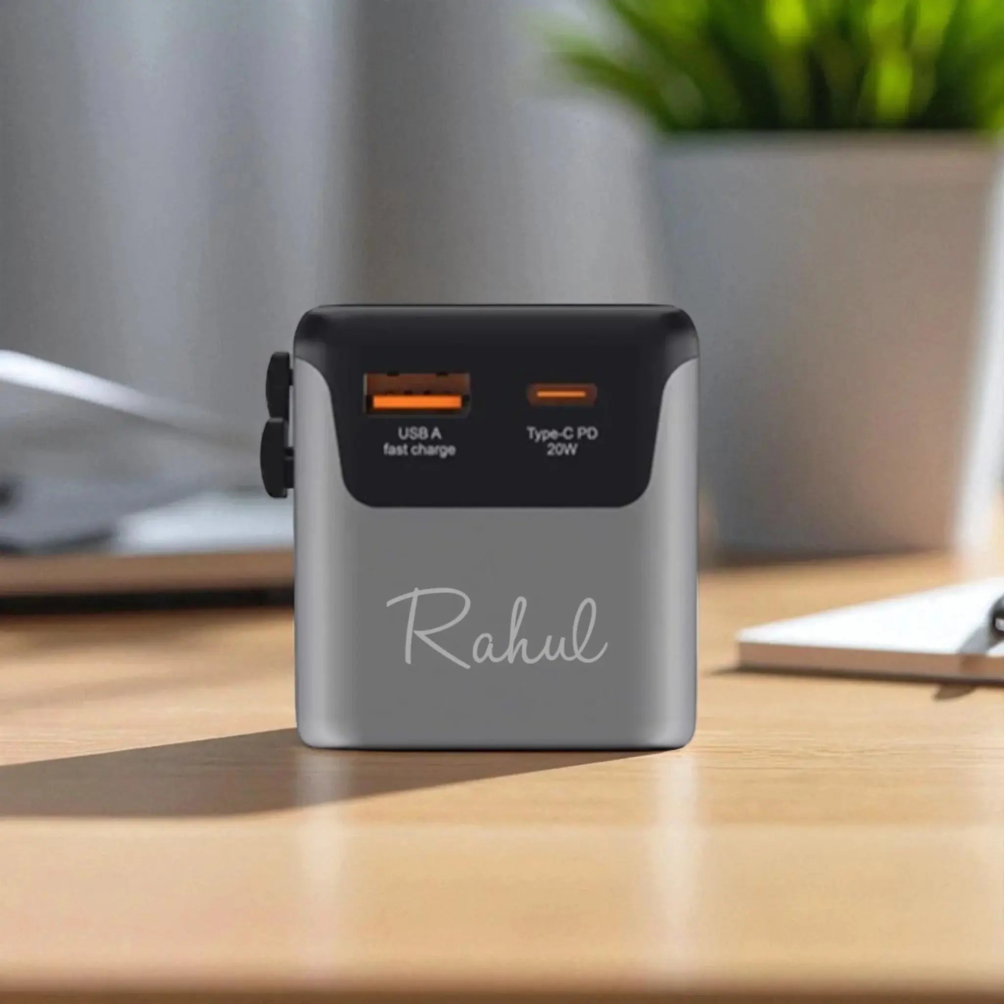Jetset Travel Adapter with USB-A and USB-C PD 20W ports, personalized with 'Rahul' engraving. Ideal for global charging needs. Main image