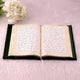 Open Quran with golden border design from Green Stones Rehal Hamper. Luxurious Islamic gift set for weddings or Eid celebrations.
