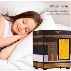 Woman sleeping with a white noise machine next to her