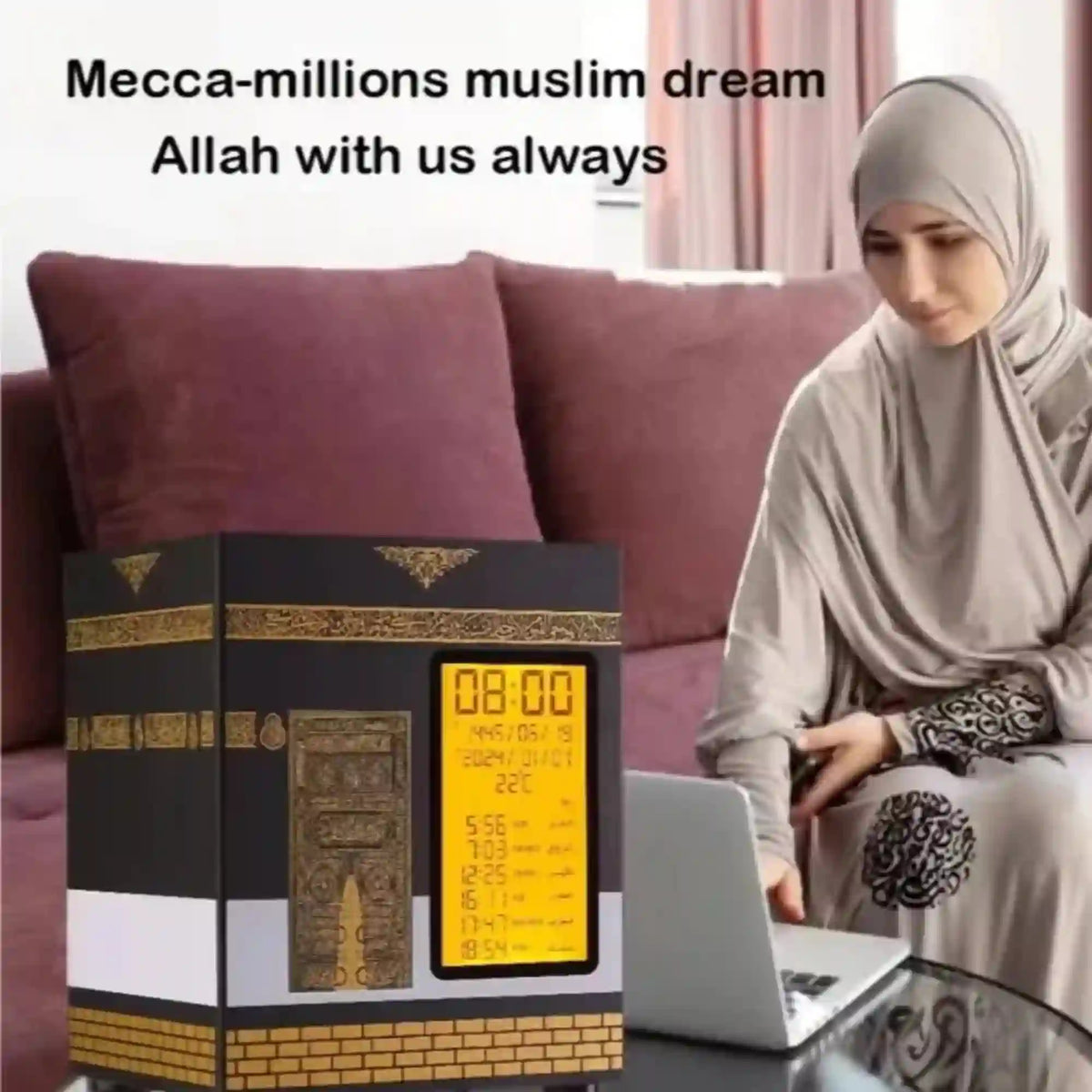 Woman sitting on a couch with a digital clock displaying prayer times, next to a large model of the Kaaba.