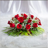 Love For Red Roses Arrangement arranged in packaging, close-up