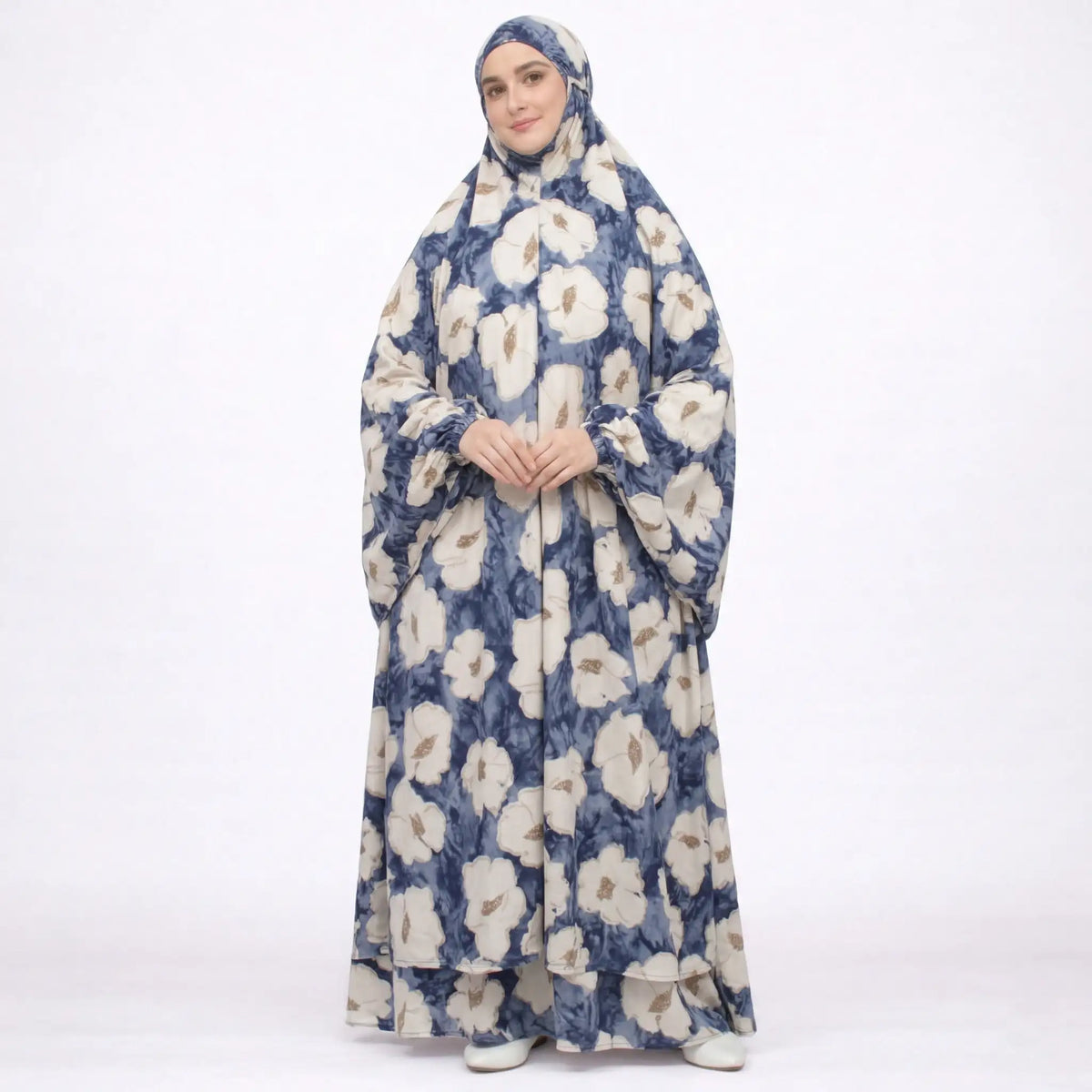 Woman in floral printed cotton prayer dress with full coverage