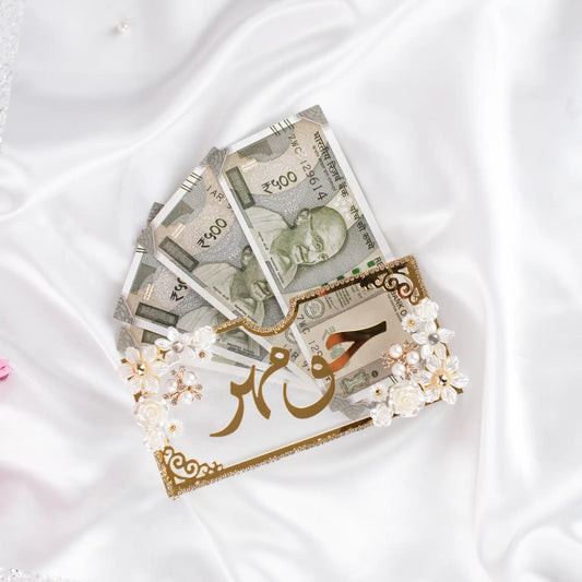 Decorative Lulu-al-Noor Haqq Mahr Envelope holding Indian currency, perfect for wedding gifting and Nikah essentials at Hadiyah Gifting.