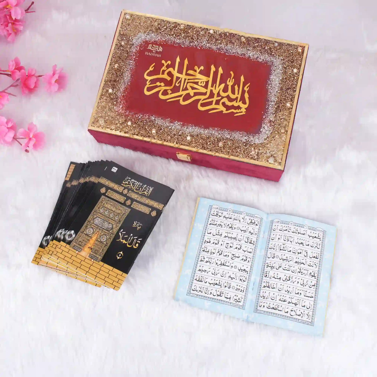 Open Quran with Arabic script on white background
