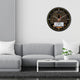 Makkah Wall Azan Clock - Al-Fatiha mounted in a modern living room, blending Islamic decor with contemporary interior design.