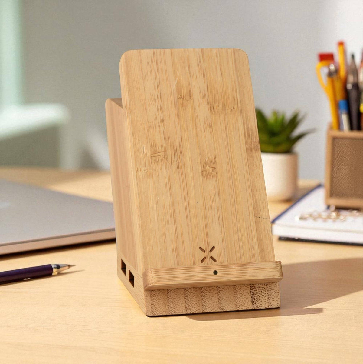 Front view of Maple 15W wireless charger & USB hub with pen stand, showcasing eco-friendly bamboo design for modern tech setups.
