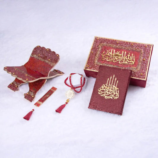 Red Islamic prayer set with Quran, tasbih, and decorative box