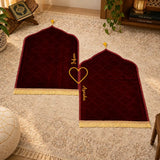 Pair of maroon velvet prayer mats with golden tassels from Maroon Bridal Hamper - Sawab-e-Jariya, perfect for couple wedding gifts.