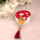 Red Tasbeeh with gold detailing and tassel, included in the Maroon Flakes Bridal Hamper, perfect for bridal religious gifting.