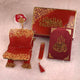Top view of Maroon Flakes Rehal Hamper showing Quran, Rehal, tasbeeh, and bookmark in a luxurious maroon and gold finish. Elegant religious gift set.