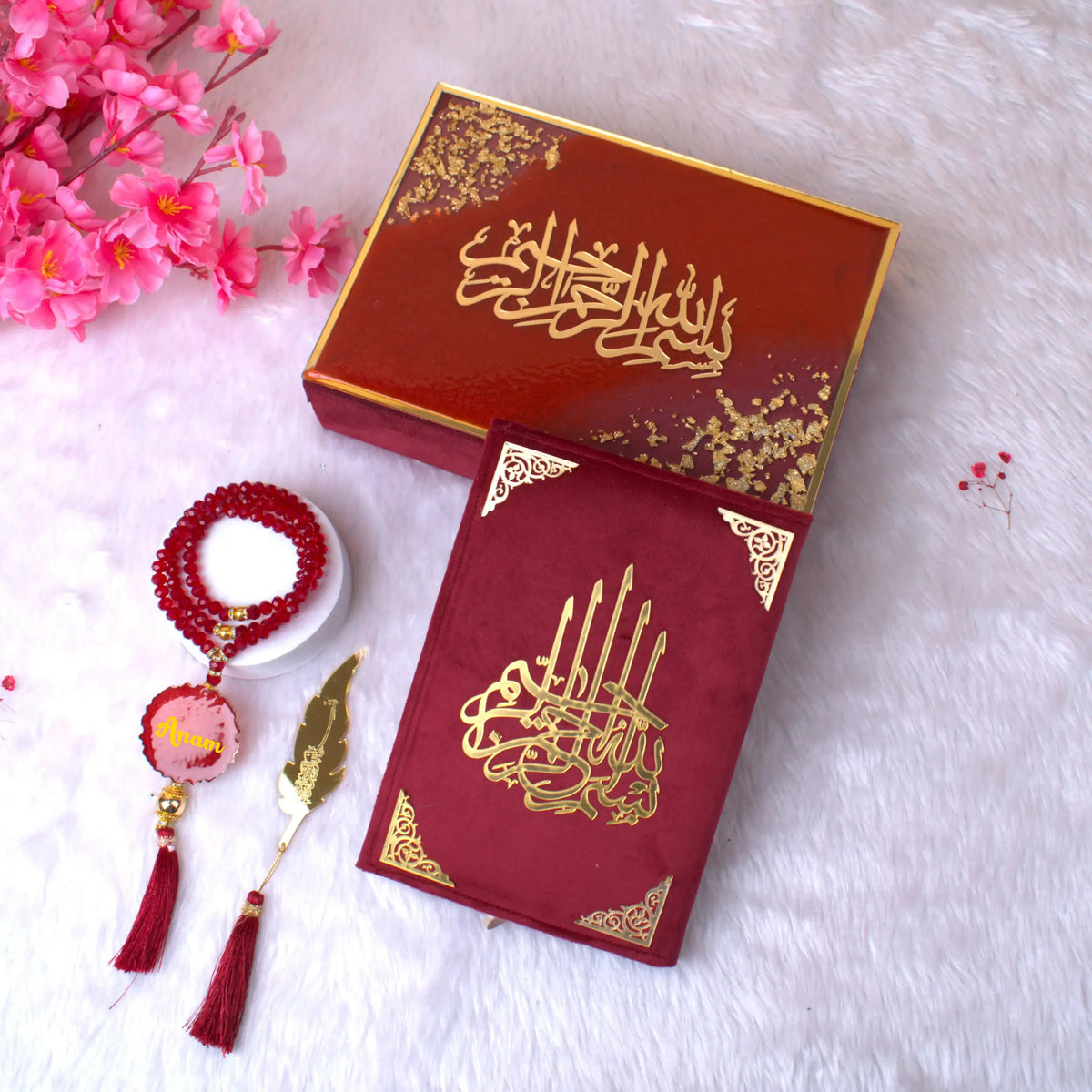 Maroon Flakes Quranic Gift Set with velvet Quran, crystal Tasbeeh, and feather bookmark in a decorative maroon and gold box. Ideal for bridal gifts.