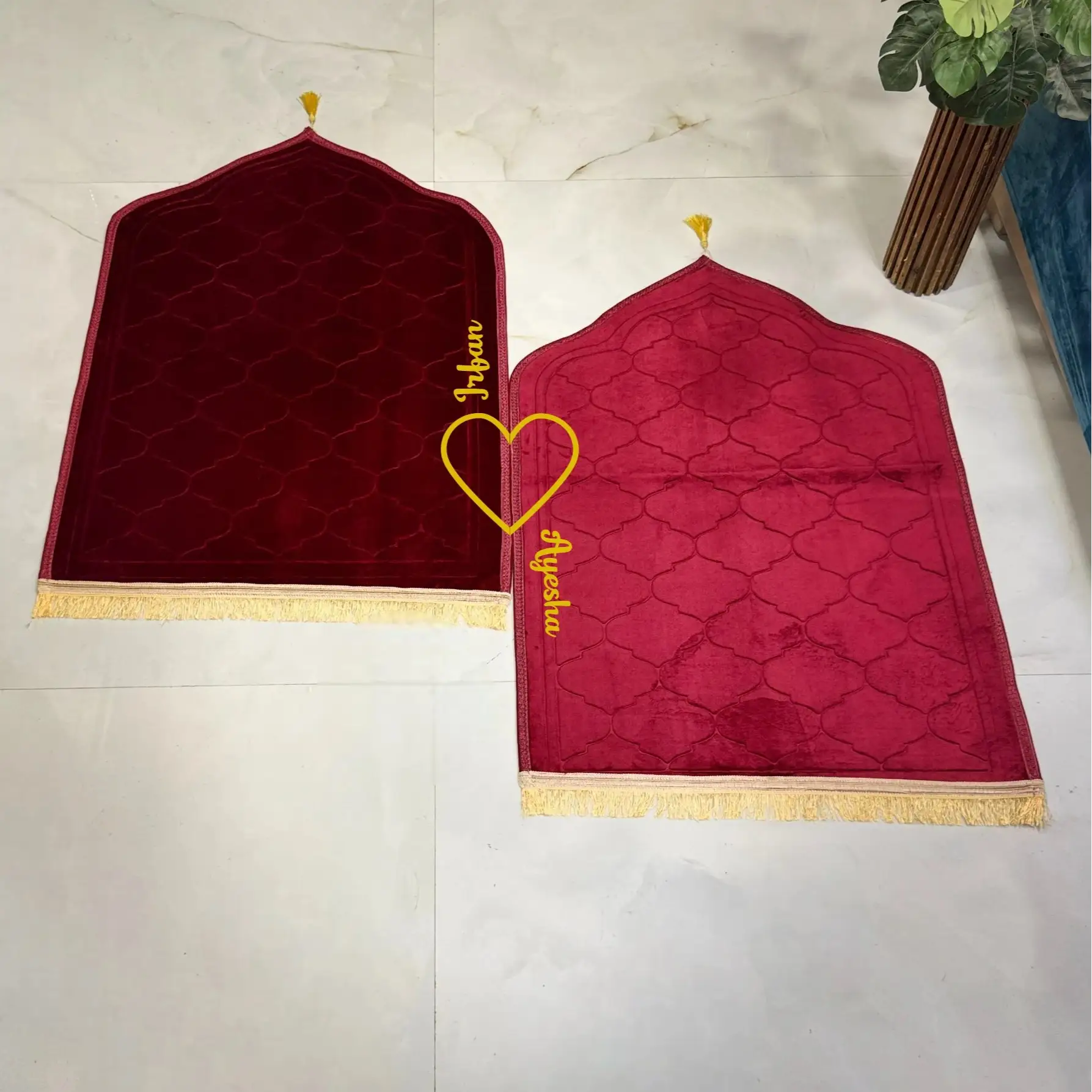 Pair of maroon velvet prayer mats with golden tassels from Maroon Bridal Hamper - Sawab-e-Jariya, perfect for couple wedding gifts. Main image
