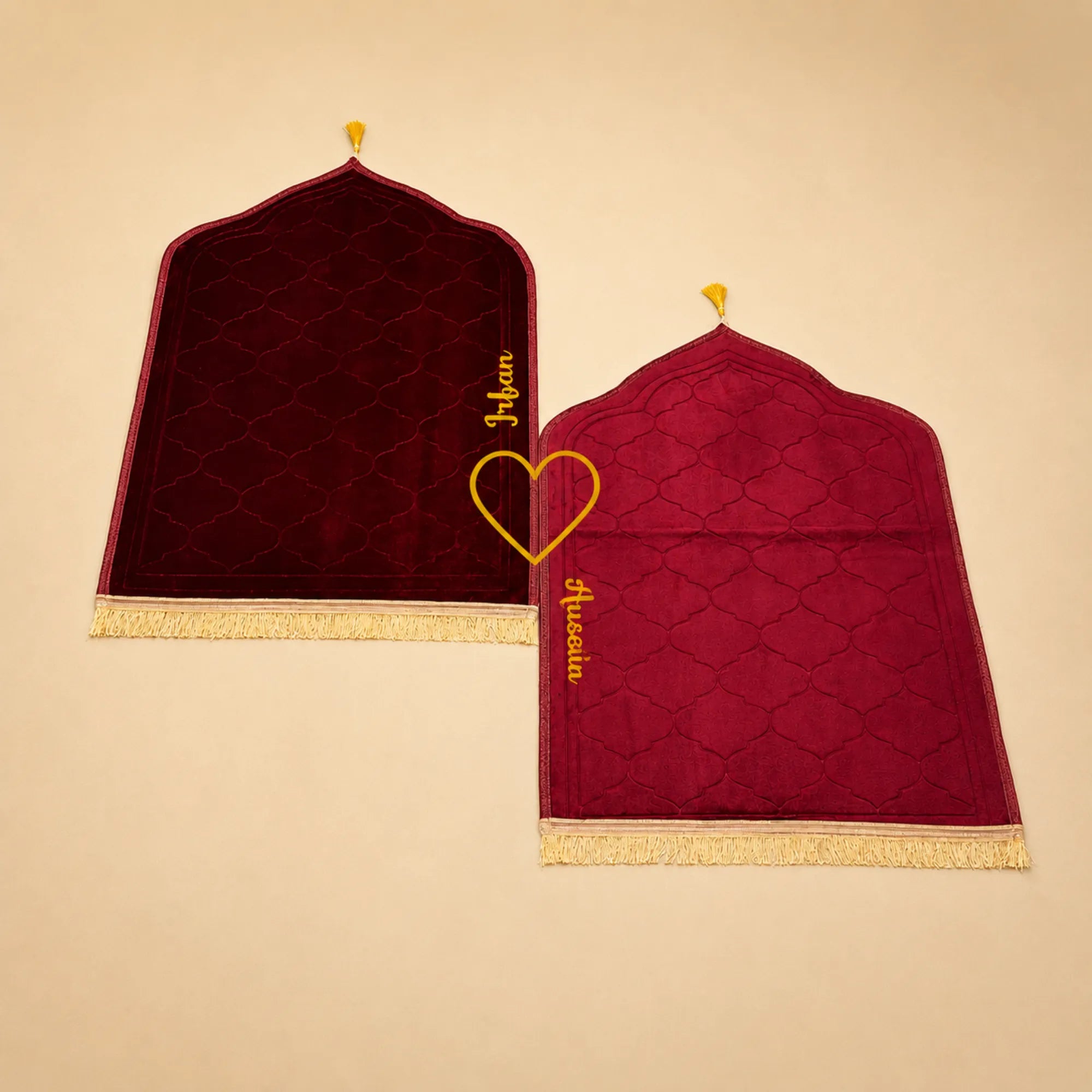 Pair of maroon velvet prayer mats with golden tassels from Maroon Bridal Hamper - Sawab-e-Jariya, perfect for couple wedding gifts. Main image