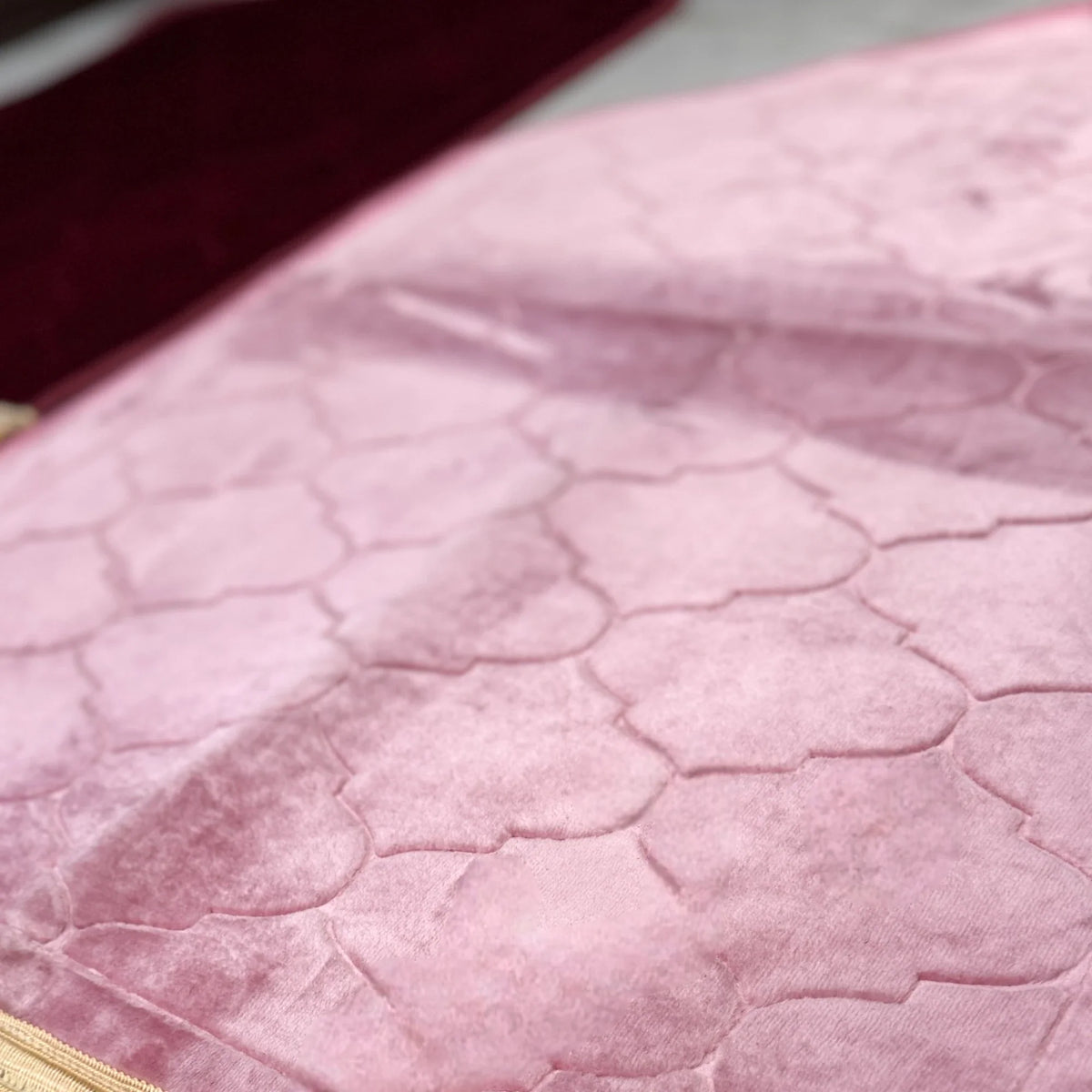 Close-up of pink dome Janamaz from Couple Prayer Mat Set, showcasing soft velvet texture and elegant geometric stitching.