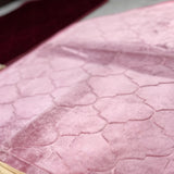 Close-up of pink dome Janamaz from Couple Prayer Mat Set, showcasing soft velvet texture and elegant geometric stitching.