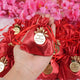 Red Nikah Favor Dry-Fruit Potli shown in hand for size reference, ideal for personalized Muslim wedding favors and gifts.