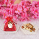 Red Nikah Favor Dry-Fruit Potli with assorted dry fruits, ideal for Muslim wedding giveaways and personalized bridal gifts.