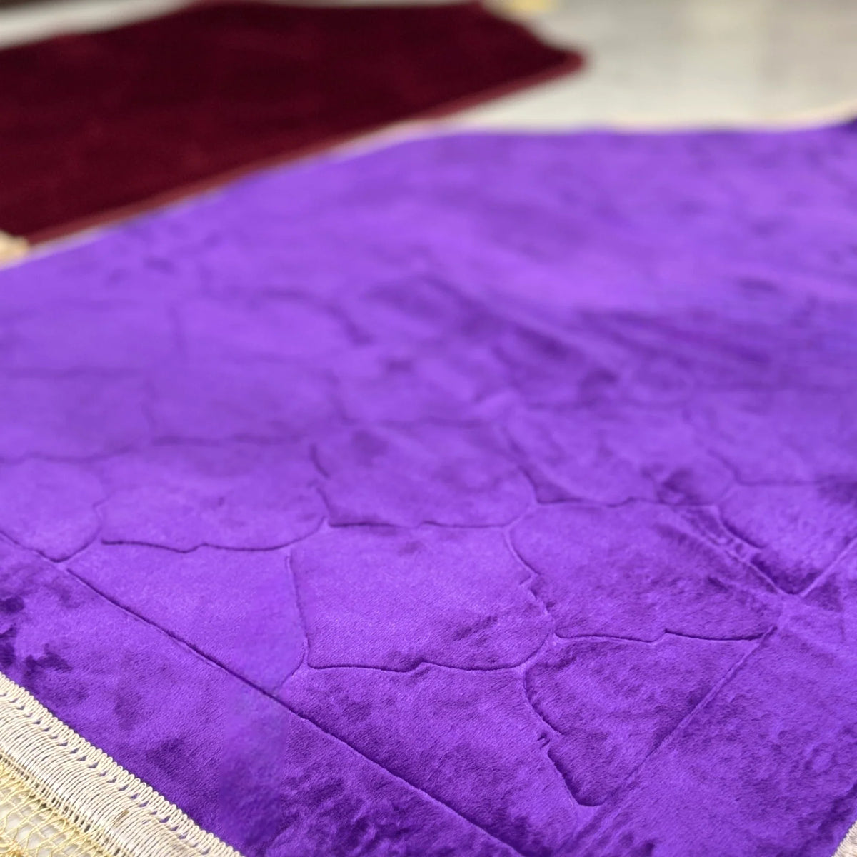 Detailed view of purple dome-shaped prayer mat from the Couple Dome Janamaz Set, showcasing soft texture and elegant stitching.