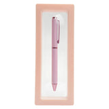 Pink pen in a matching pink case on a white background