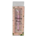 Pink pen in a decorative box with 'Blooming Mogra' branding on a white background