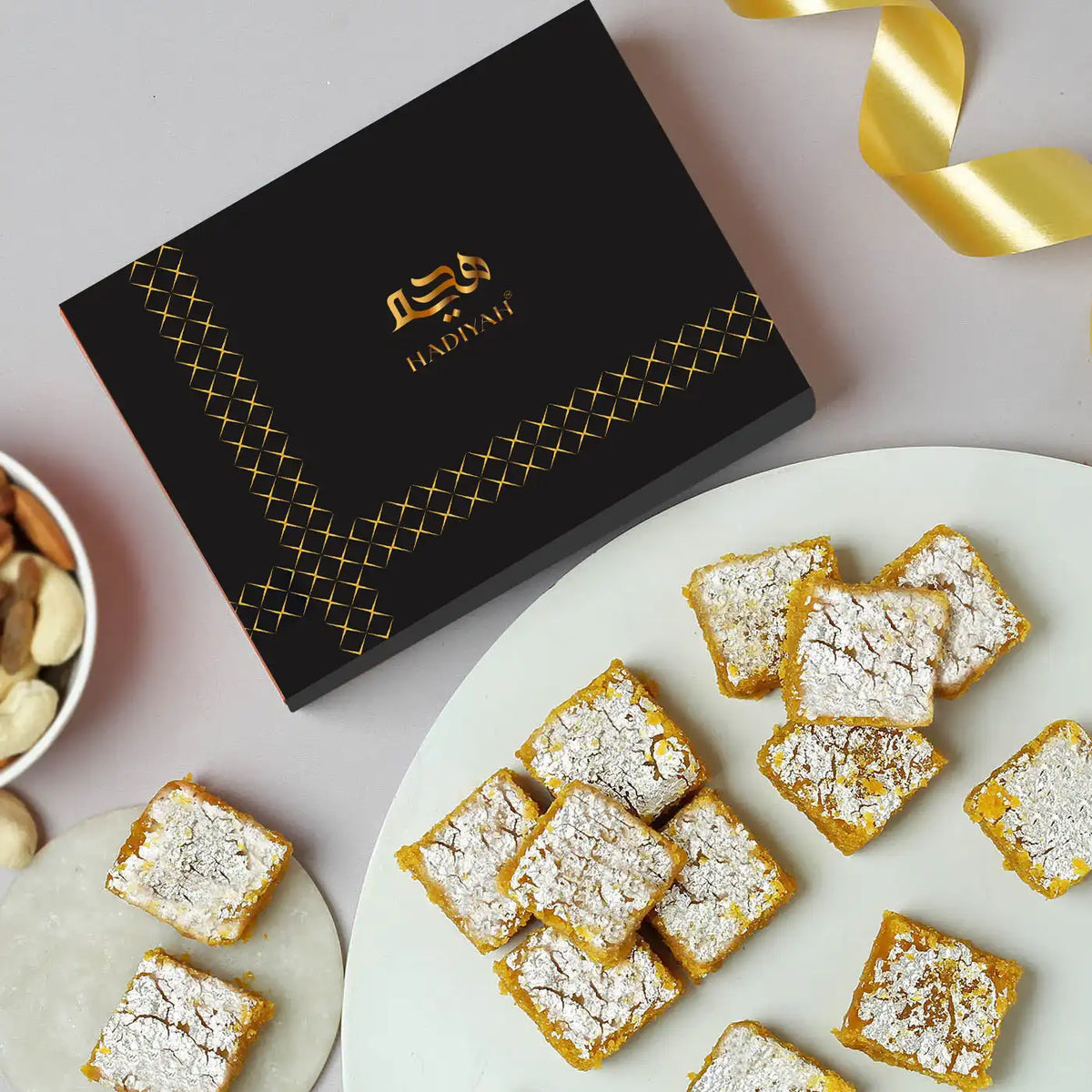 Moong Dal Barfi Desi Ghee - Traditional Indian Sweet in elegant black gift box with silver foil topping, ideal for festive gifting and celebrations.
