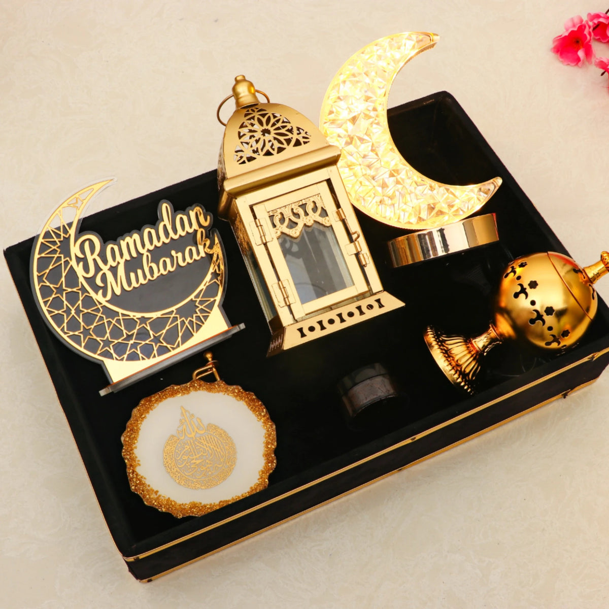 Top view of Nazakat Luxury Ramadan Hamper with decorative moon lamp, lantern, and Islamic calligraphy plaque in a velvet tray for Ramadan celebrations.