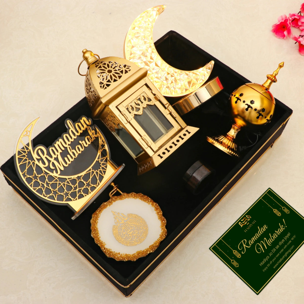 Premium Nazakat Luxury Ramadan Hamper with crescent moon lamp, lantern, bakhoor burner, and greeting card in a velvet tray, perfect for Ramadan gifts.