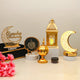 Elegant Nazakat Luxury Ramadan Hamper featuring a glowing crescent moon lamp, gold lantern, and velvet tray, perfect for festive religious gifting.