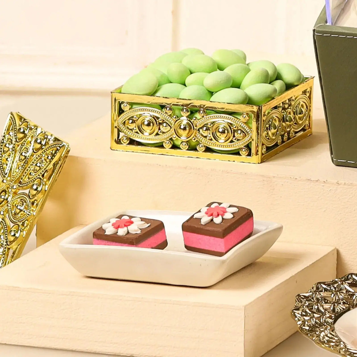 Nazrana-e-Tohfa Set features decorative sweets and green-coated nuts in ornate trays, ideal for luxury wedding and Eid gift hampers.