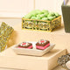 Nazrana-e-Tohfa Set features decorative sweets and green-coated nuts in ornate trays, ideal for luxury wedding and Eid gift hampers.
