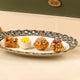 Plated selection from Nazrana-e-Tohfa Set showcasing baklava, coconut sweet, and nut-covered delights for festive gourmet gifting.
