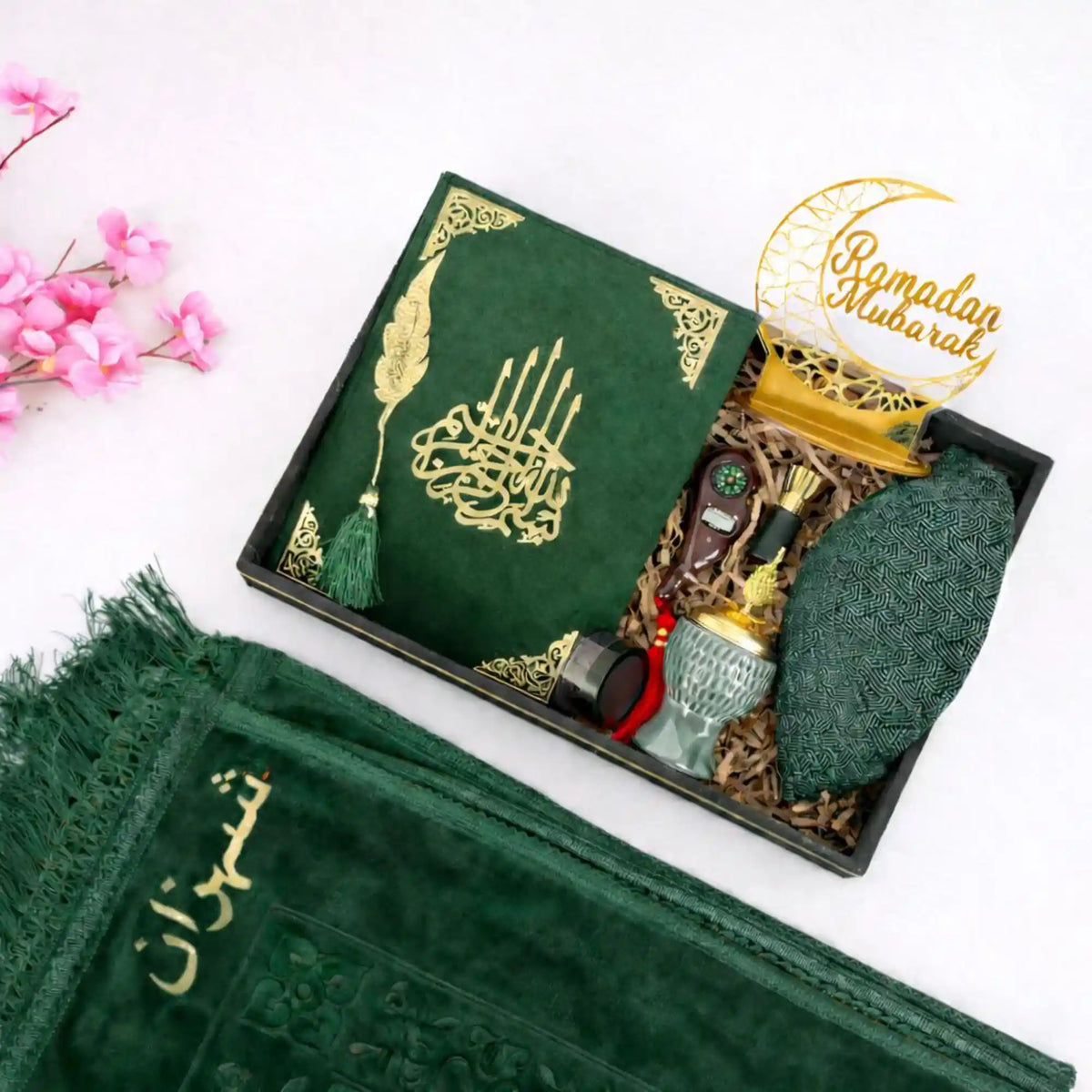 Taqwa Ramadan Men's Hamper in emerald green, featuring a velvet Kaaba Quran, patterned kufi, bakhoor burner, attar, digital tasbeeh, Ramadan Mubarak stand, and a matching green velvet janamaz.