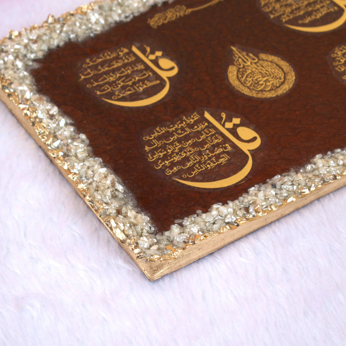 Close-up of Red Stone Islamic Frame showing golden 4 Qul Surahs and crystal-studded border, a luxurious Islamic gift and decor piece.