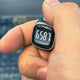 Close-up of Noor Zikr Ring 2.0 showing 6581 zikr count on bright digital display, ideal for prayer reminders.