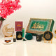 Green Noor Al-Ramadan Gift Box with tasbeeh, hijab, Islamic book, and decor, perfect for Ramadan celebrations and religious gifting.
