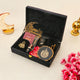 Open black Noor Al-Ramadan Gift Box with prayer items, hijab, and decor, beautifully arranged for Ramadan celebrations.