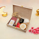 Ramadan Gift Box open with essentials like tasbeeh, hijab, candle, and decor, beautifully arranged for festive gifting.