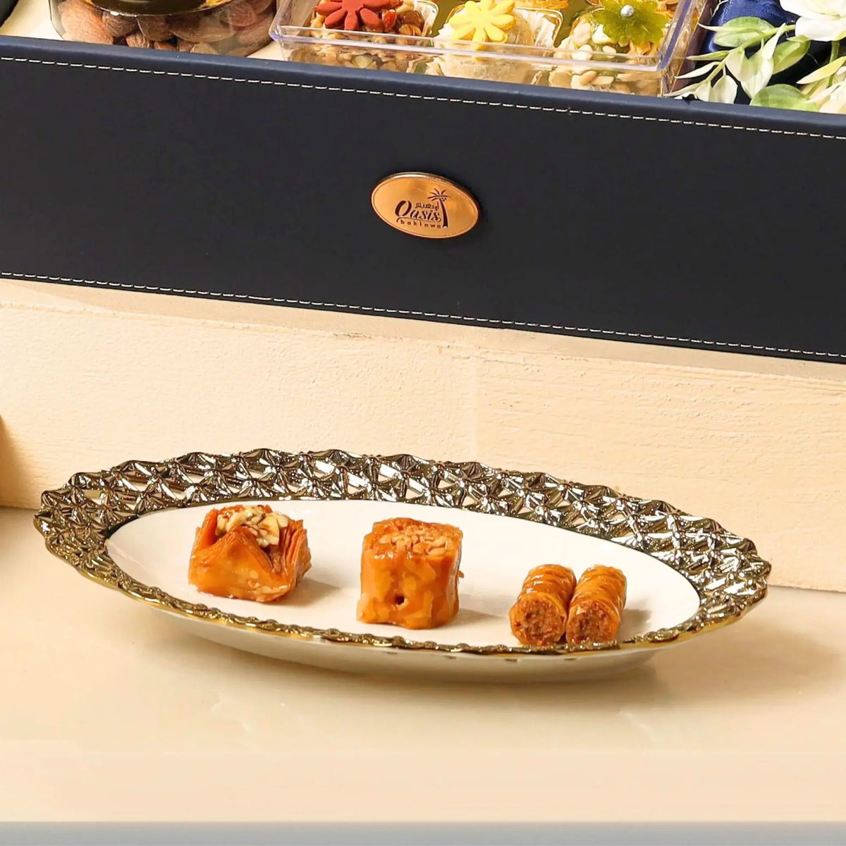 Plated selection of baklava and nutty sweets from the Barakah Bites Festive Hamper - Festive Food Hamper, perfect for elegant festive presentations.