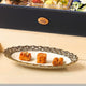 Plated selection of baklava and nutty sweets from the Barakah Bites Festive Hamper - Festive Food Hamper, perfect for elegant festive presentations.