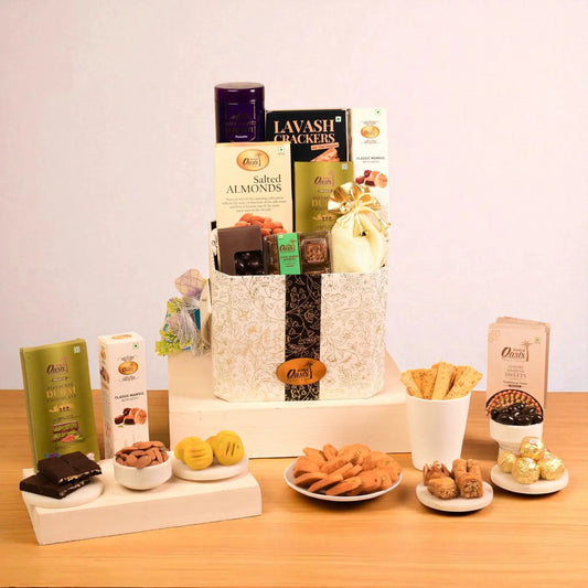Noor-e-Zaiqa Hamper - Festive Gourmet Food gift basket with pista kunefa, baklava, salted almonds, cookies, and chocolates for special occasions.