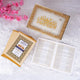 Golden framed Quran with pink flowers