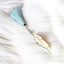 Islamic Feather Bookmark Bismillah with light blue tassel, a delicate and durable gift for readers who value faith and style.