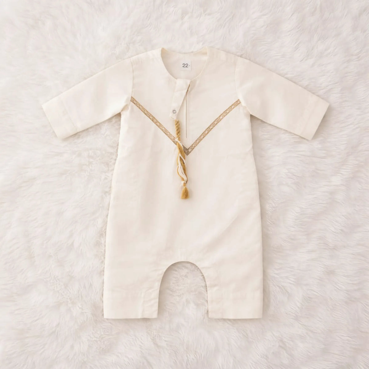 Offwhite baby boy thobe romper with gold embroidery and tassel