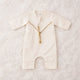 Offwhite baby boy thobe romper with gold embroidery and tassel