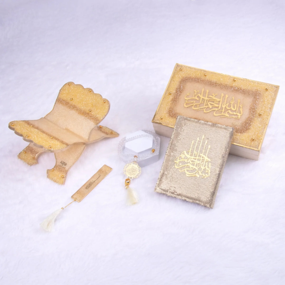 Religious gift set with Quran, decorative box, and prayer accessories