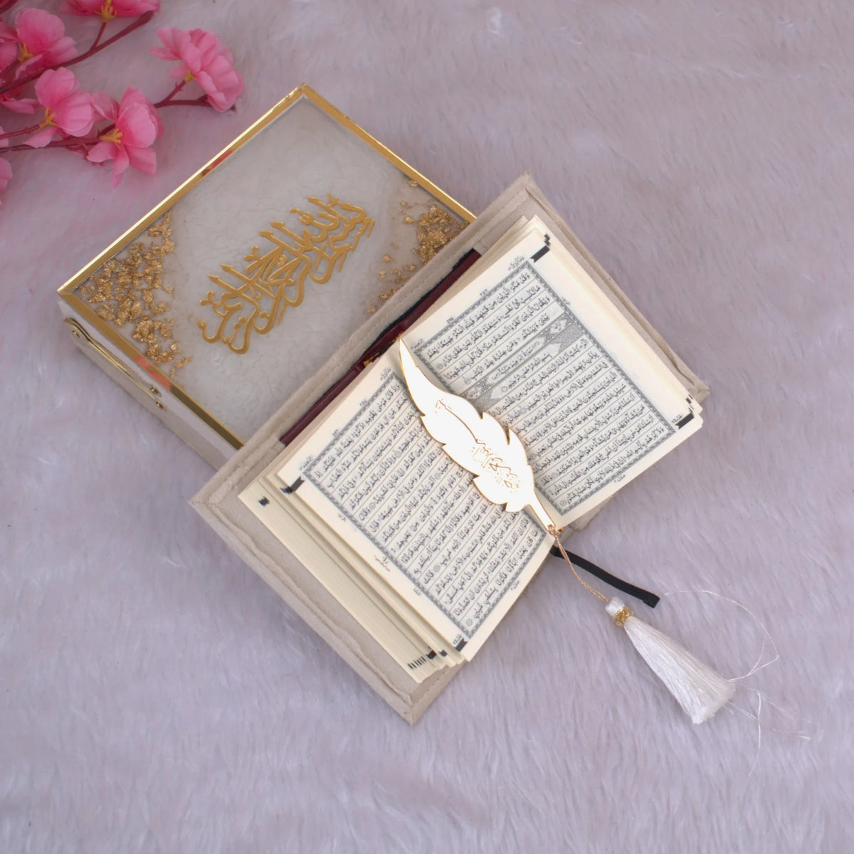 Open Mini Tilawat-e-Quran from the Offwhite Flakes Velvet Gift Set with feather-shaped gold bookmark and decorative box. Perfect for ceremonial use.