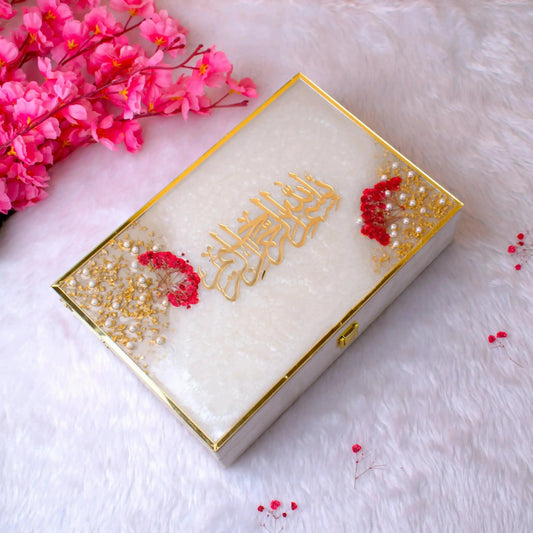 Offwhite floral Quran gift box with Arabic calligraphy and pearl embellishments from the Floral Pearl Rehal Hamper. Luxurious Islamic gift.