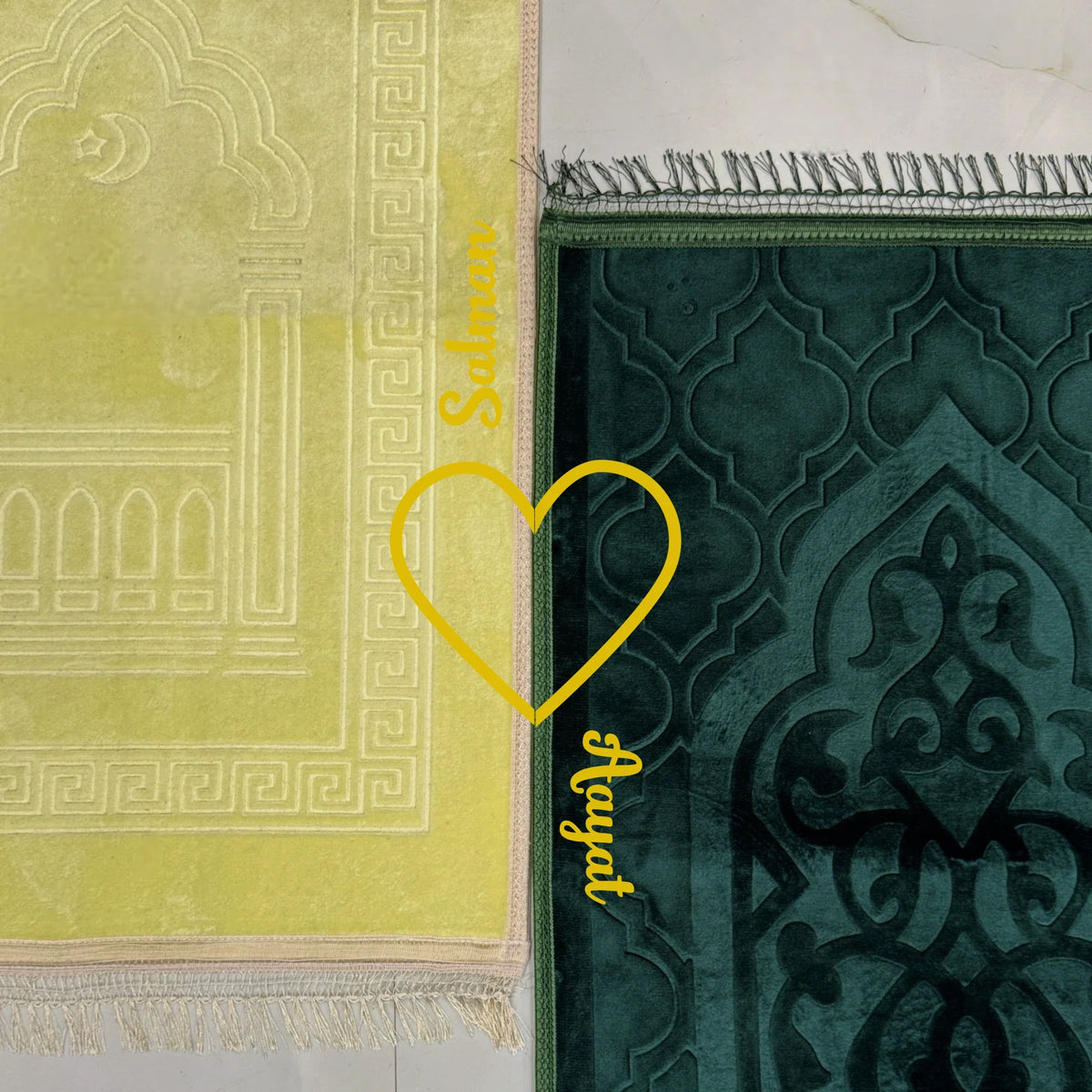Close-up of personalized offwhite and green couple Janamaz with heart motif, showcasing names and intricate prayer rug patterns.