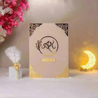 Personalized Whispering Flowers Nikah Nama cover in beige with gold and black detailing, perfect Islamic wedding keepsake for couples.
