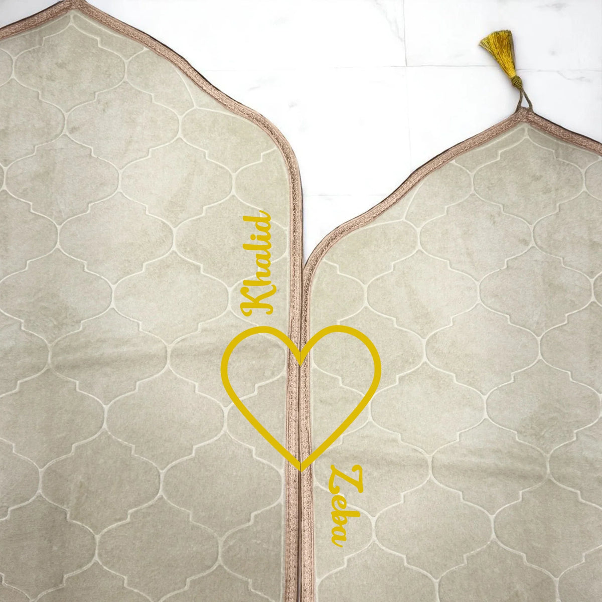 Close-up of personalized Dome Couple Janamaz Set with names and heart motif, ideal for wedding or bridal prayer gifts.